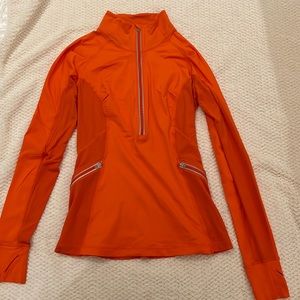 Lululemon orange half zip, size 8